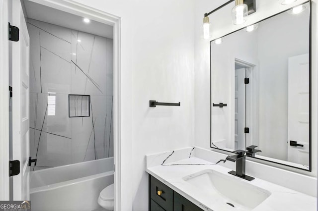 bathroom with toilet, shower / bath combination, and vanity