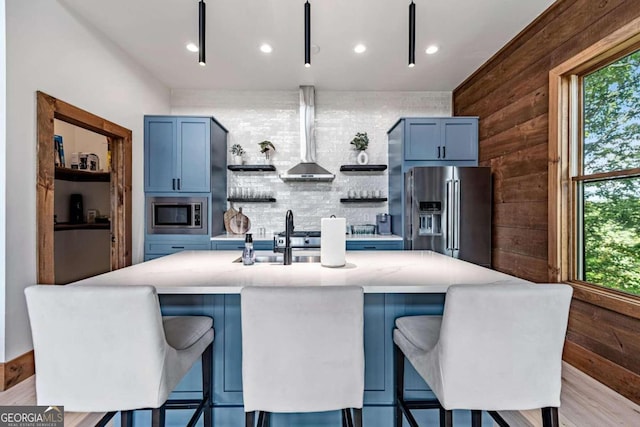 351 S Dream Catcher, Blue Ridge, GA 30513 - kitchen featuring appliances with stainless steel finishes, open shelves, plenty of natural light, wall chimney exhaust hood, and recessed lighting