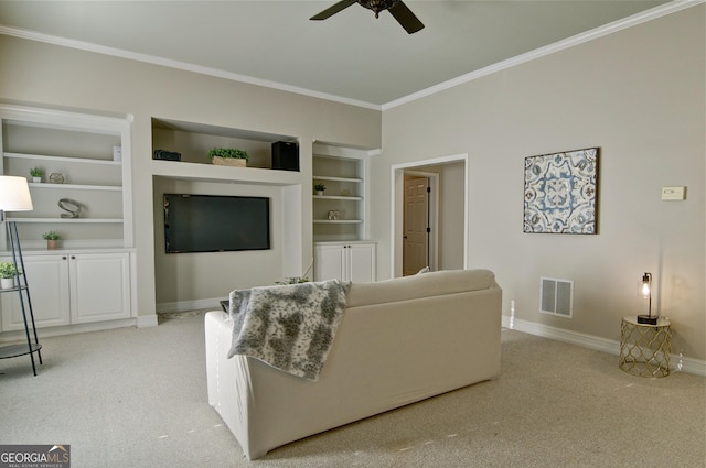 living room with ornamental molding, baseboards, visible vents, and light carpet