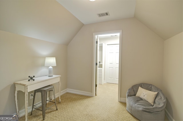 sitting room featuring vaulted ceiling, carpet, visible vents, and baseboards