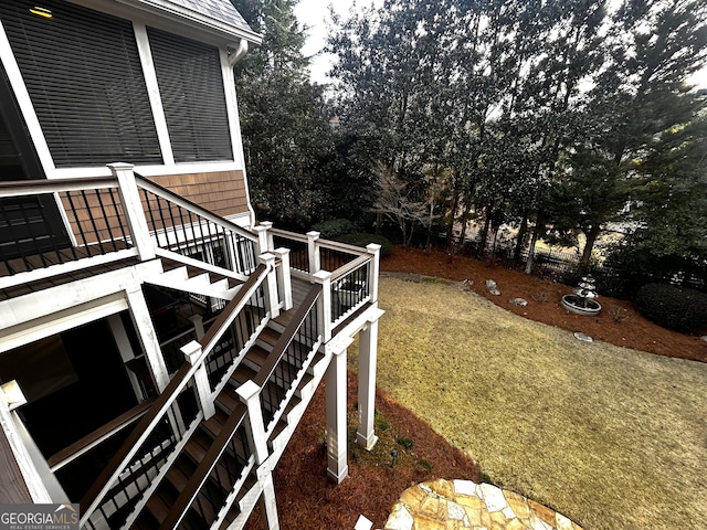 view of yard featuring stairs and a deck