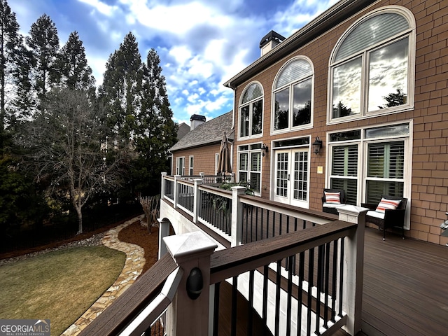 wooden terrace featuring french doors