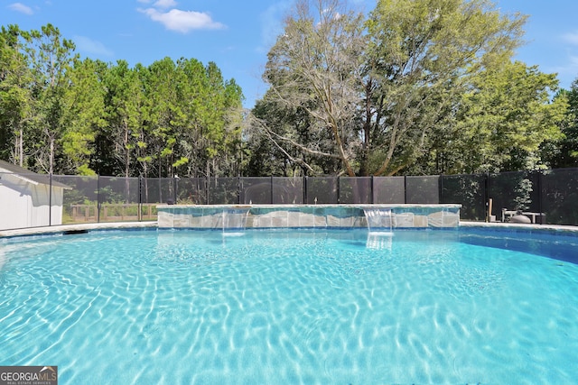 view of pool with fence and a fenced in pool