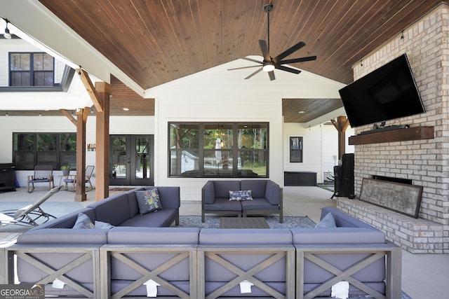 view of patio featuring french doors, an outdoor living space, and a ceiling fan