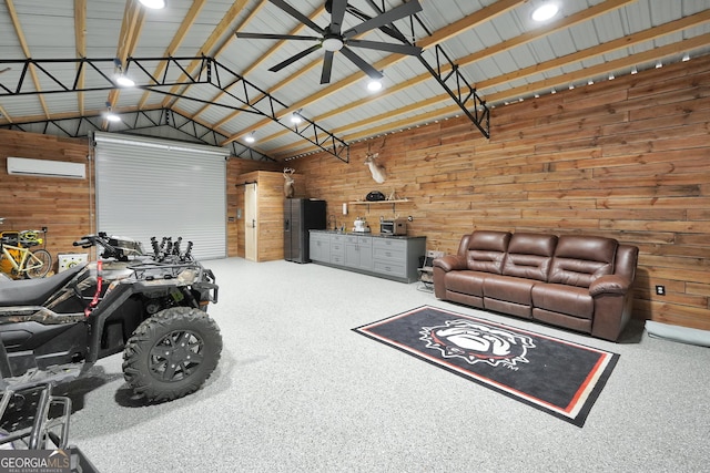 garage with a ceiling fan, a wall unit AC, and metal wall