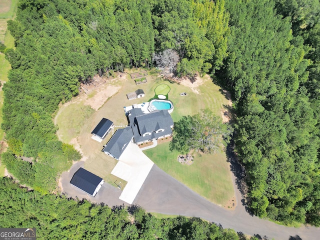 aerial view with a wooded view