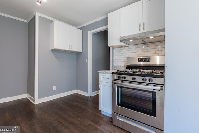 kitchen featuring white cabinets, gas range, and under cabinet range hood