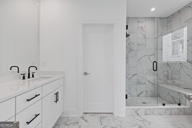 bathroom featuring a marble finish shower, baseboards, marble finish floor, vanity, and recessed lighting