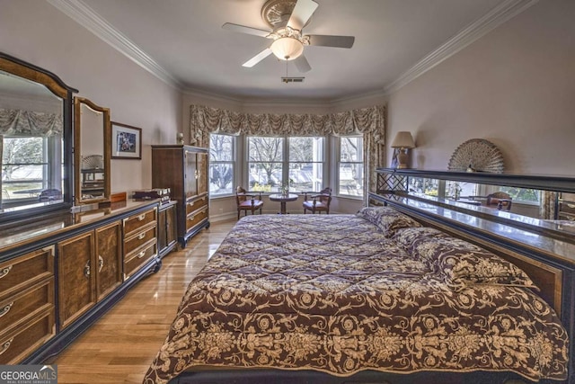 520 Camp Perrin Rd, Lawrenceville, GA 30043 - bedroom with baseboards, visible vents, crown molding, and light wood finished floors