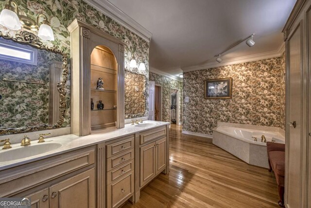 520 Camp Perrin Rd, Lawrenceville, GA 30043 - full bath with a sink, wallpapered walls, crown molding, and wood finished floors