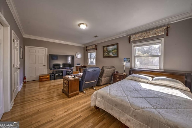 520 Camp Perrin Rd, Lawrenceville, GA 30043 - bedroom with light wood-style flooring, multiple windows, visible vents, and ornamental molding