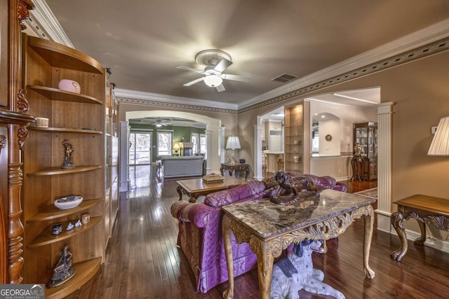 520 Camp Perrin Rd, Lawrenceville, GA 30043 - dining area with arched walkways, dark wood-style flooring, crown molding, visible vents, and ceiling fan