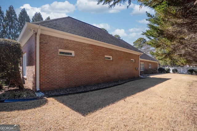 520 Camp Perrin Rd, Lawrenceville, GA 30043 - view of property exterior featuring a shingled roof, brick siding, and driveway
