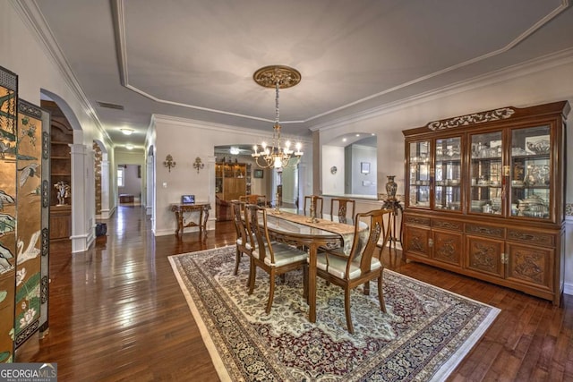 520 Camp Perrin Rd, Lawrenceville, GA 30043 - dining room with visible vents, arched walkways, dark wood-style flooring, and a notable chandelier