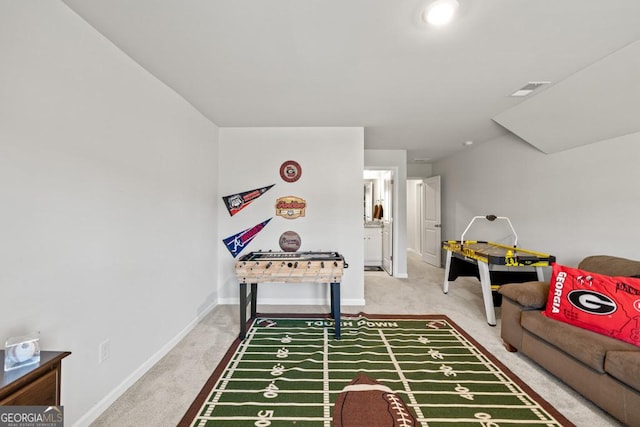 game room with visible vents, baseboards, and carpet