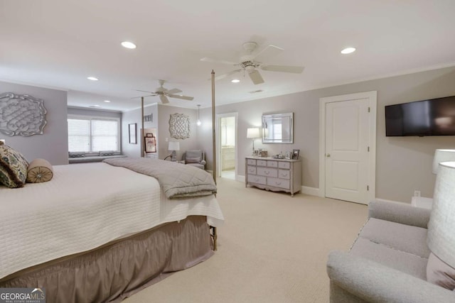 bedroom featuring baseboards, light colored carpet, ensuite bath, ceiling fan, and recessed lighting