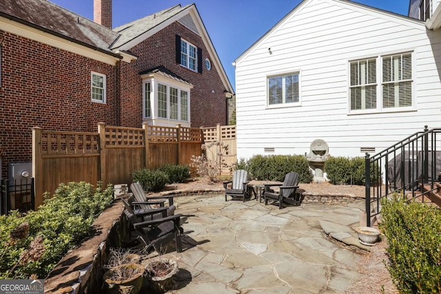 view of patio with fence