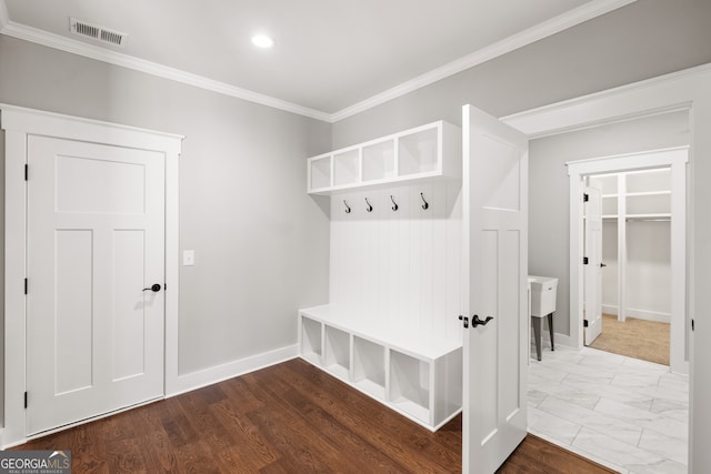 mudroom with baseboards, visible vents, ornamental molding, marble finish floor, and recessed lighting