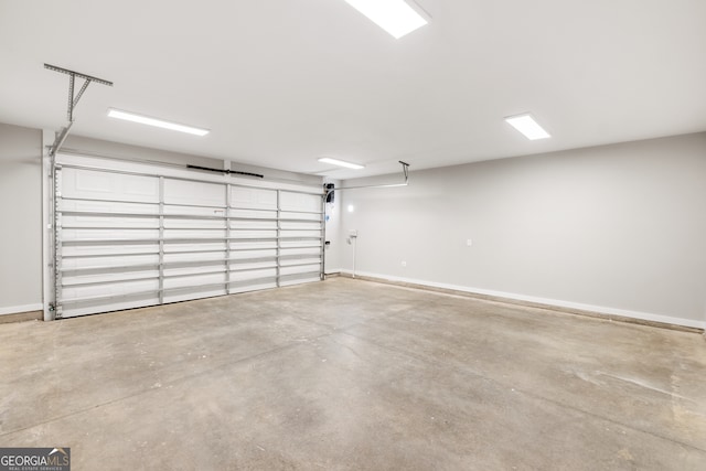 garage featuring baseboards