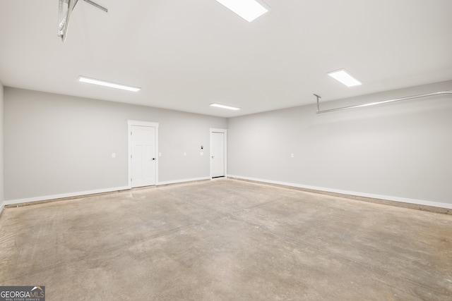 garage with baseboards