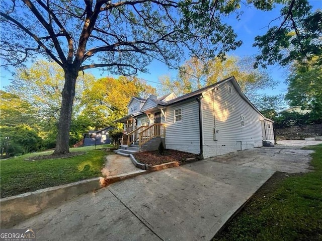 view of home's exterior featuring a lawn