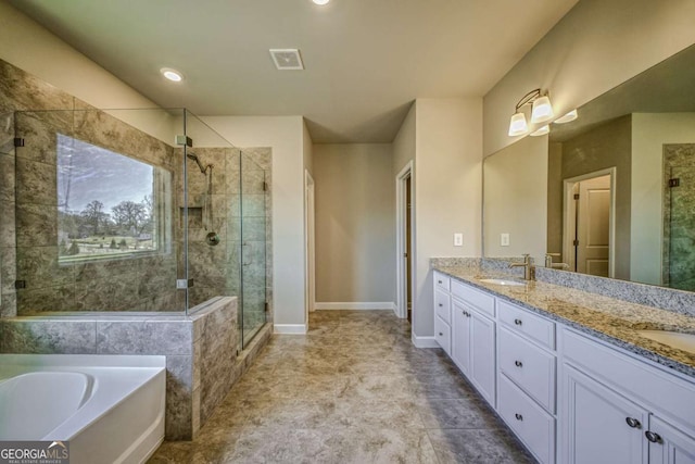 full bathroom with a sink, visible vents, baseboards, a shower stall, and double vanity