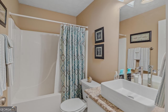 full bath featuring toilet, shower / bath combo with shower curtain, and vanity