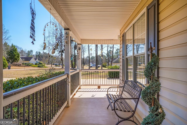 wooden terrace with covered porch