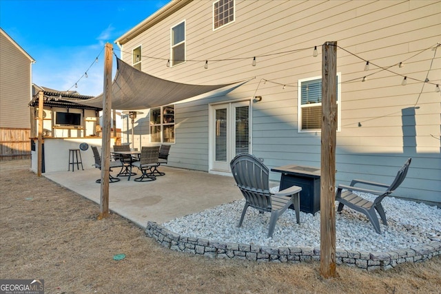 rear view of property with a patio area