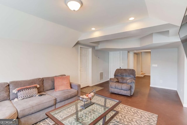 living room with recessed lighting, visible vents, and baseboards