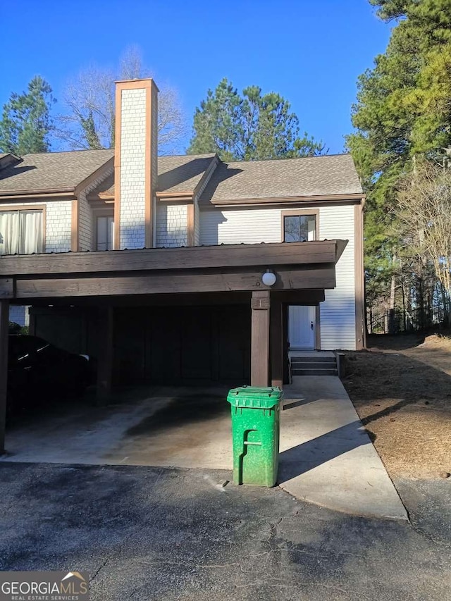 exterior space featuring a chimney