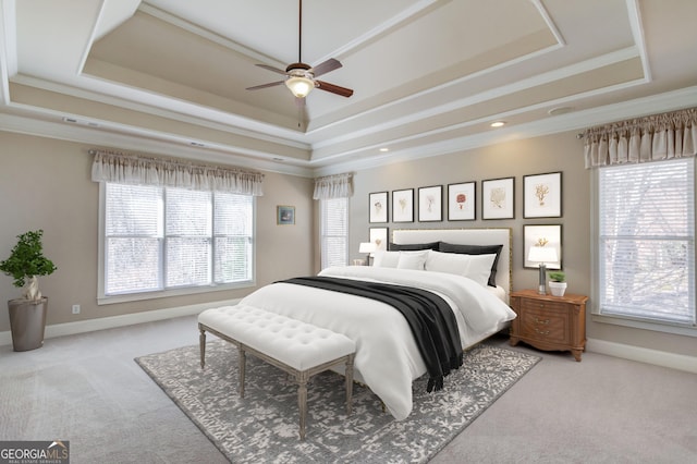 5016 Deer Creek Ct, Flowery Branch, GA 30542 - carpeted bedroom featuring a tray ceiling, multiple windows, crown molding, and recessed lighting
