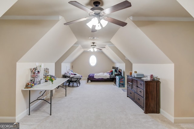 bedroom with lofted ceiling, light carpet, visible vents, baseboards, and a ceiling fan