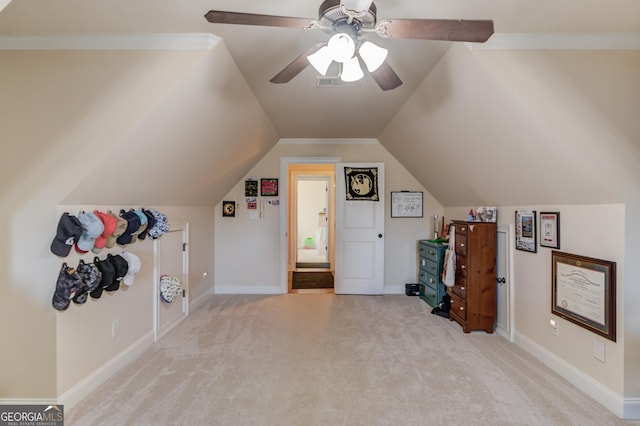 bonus room featuring vaulted ceiling, carpet flooring, visible vents, and baseboards