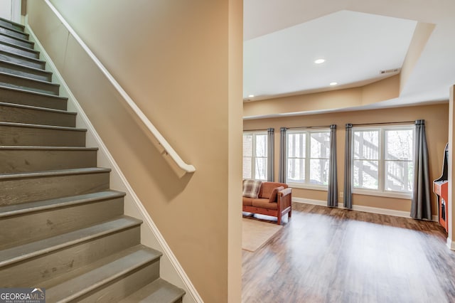 5016 Deer Creek Ct, Flowery Branch, GA 30542 - staircase featuring wood finished floors, plenty of natural light, and recessed lighting
