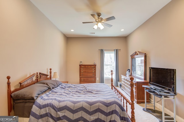 carpeted bedroom featuring baseboards, ceiling fan, and recessed lighting