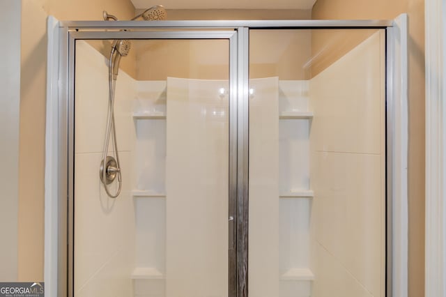 bathroom with a stall shower