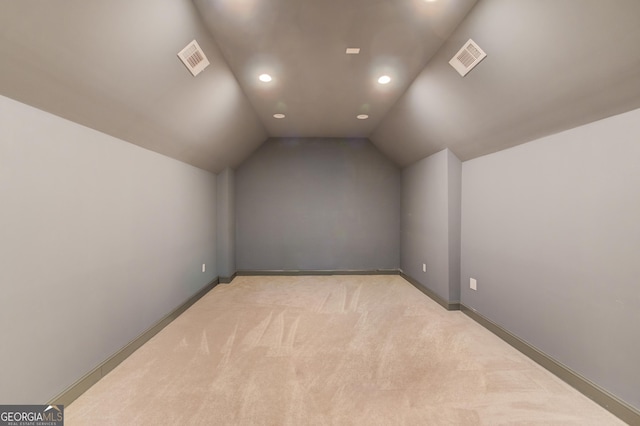 5016 Deer Creek Ct, Flowery Branch, GA 30542 - additional living space with light carpet, vaulted ceiling, and recessed lighting