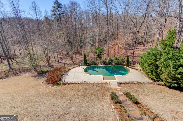5016 Deer Creek Ct, Flowery Branch, GA 30542 - swimming pool featuring a patio area