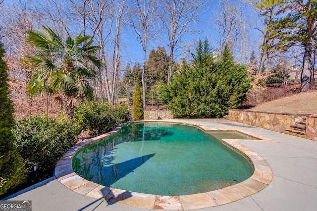 5016 Deer Creek Ct, Flowery Branch, GA 30542 - outdoor pool featuring a patio area