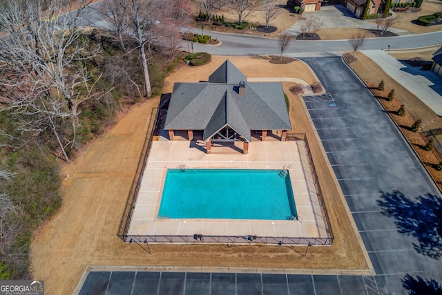 view of pool with a fenced in pool