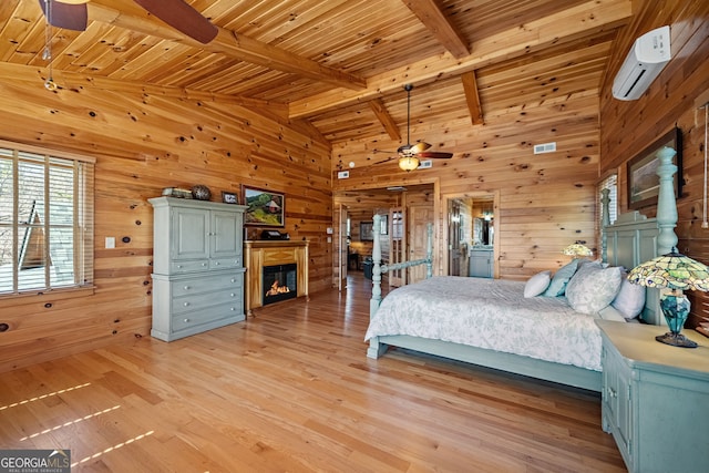 unfurnished bedroom featuring wooden walls, wood ceiling, light wood-style flooring, beamed ceiling, and a wall mounted air conditioner