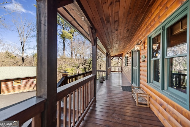 wooden deck with a porch