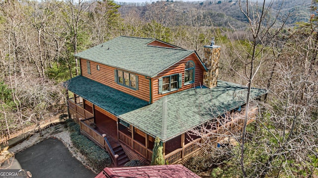 bird's eye view with a forest view