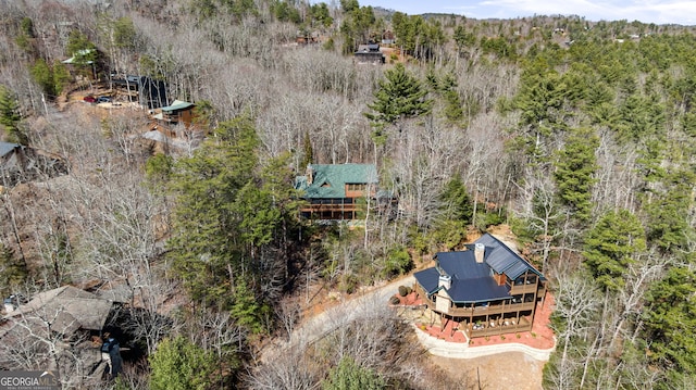 aerial view with a wooded view