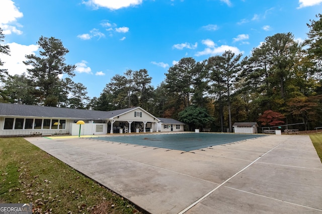 pool featuring a patio area