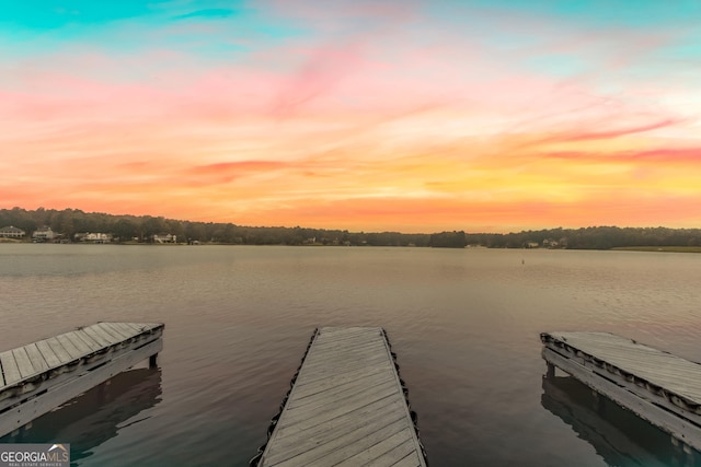 view of dock with a water view