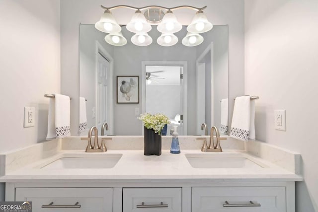 full bath with double vanity and a sink