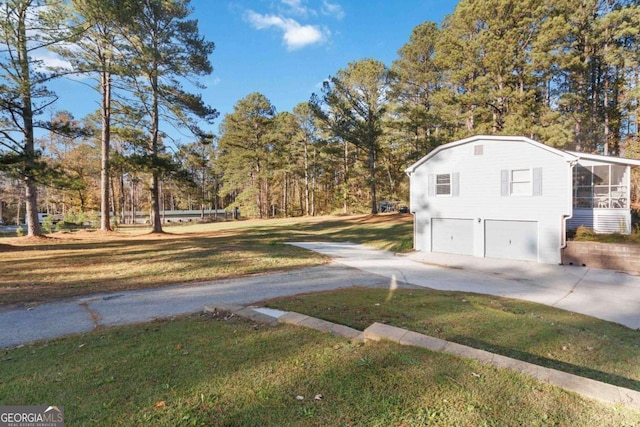 view of road with driveway and sidewalks