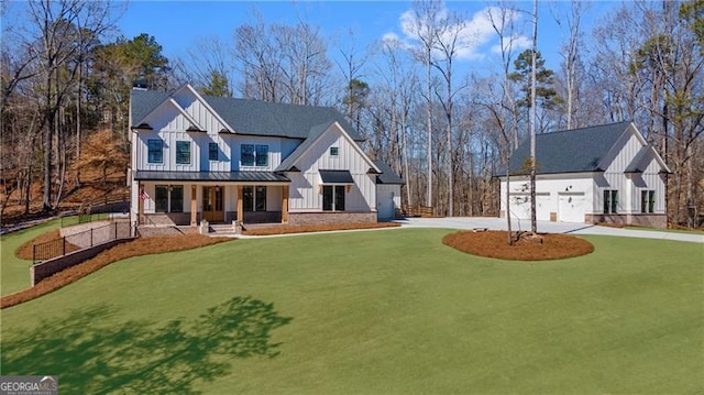 6326 Point Twenty Two, Gainesville, GA 30506 - modern farmhouse style home featuring a standing seam roof, covered porch, board and batten siding, concrete driveway, and a front yard